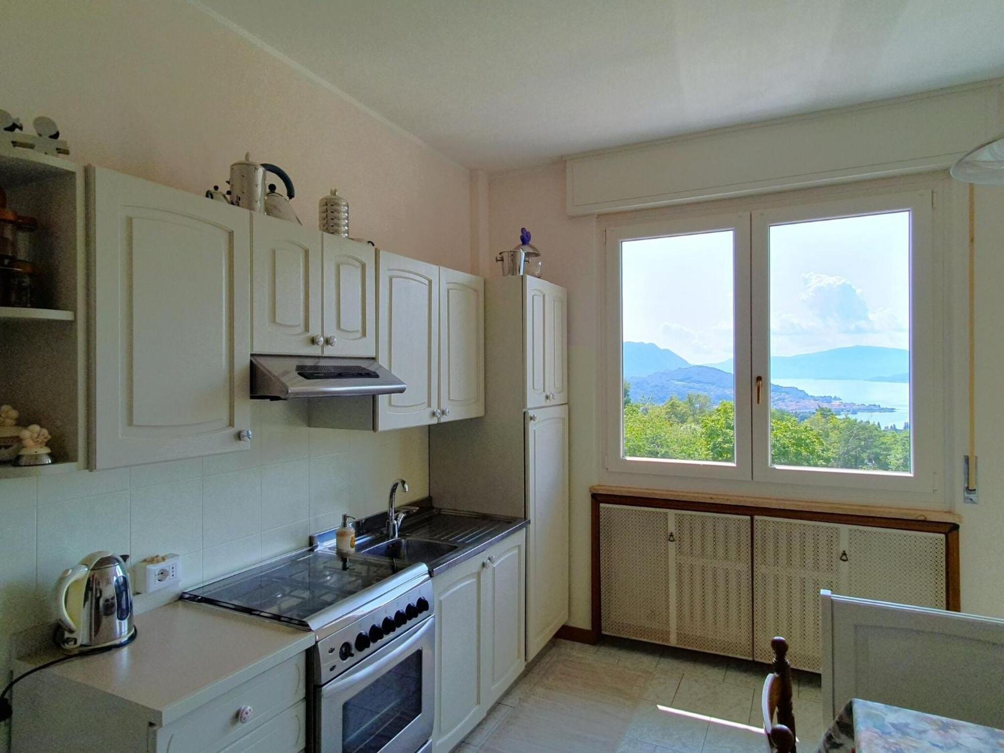 Villa With Enchanting Garden Overlooking The Lake Luino Bagian luar foto